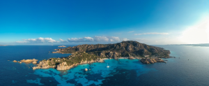 Bright blue waters surround La Maddalena on a sunny day