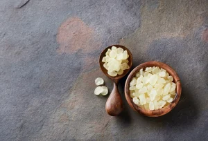 Wooden bowl and spoon filled with mastiha